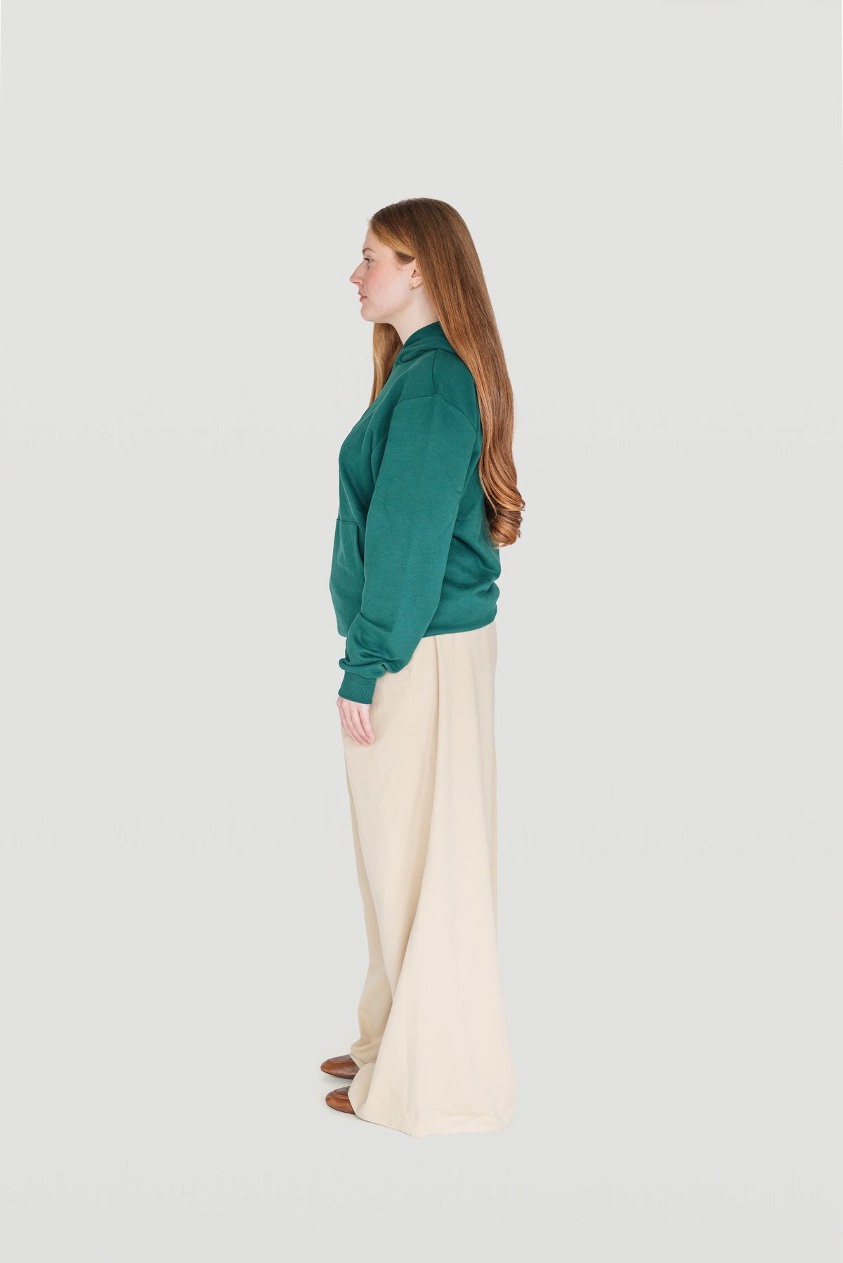 Side view of the green Le Butin8 Gratitude hoodie