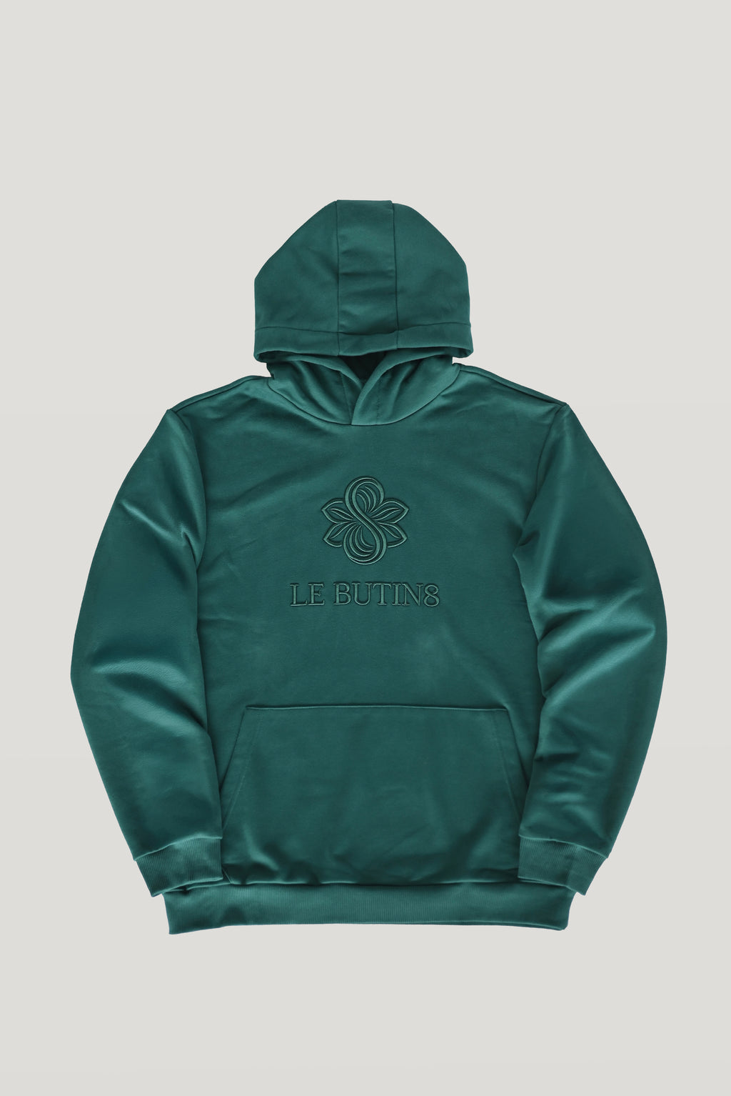 Green Le Butin8 Gratitude hoodie, front flat lay with the embroidered Le Butin8 logo